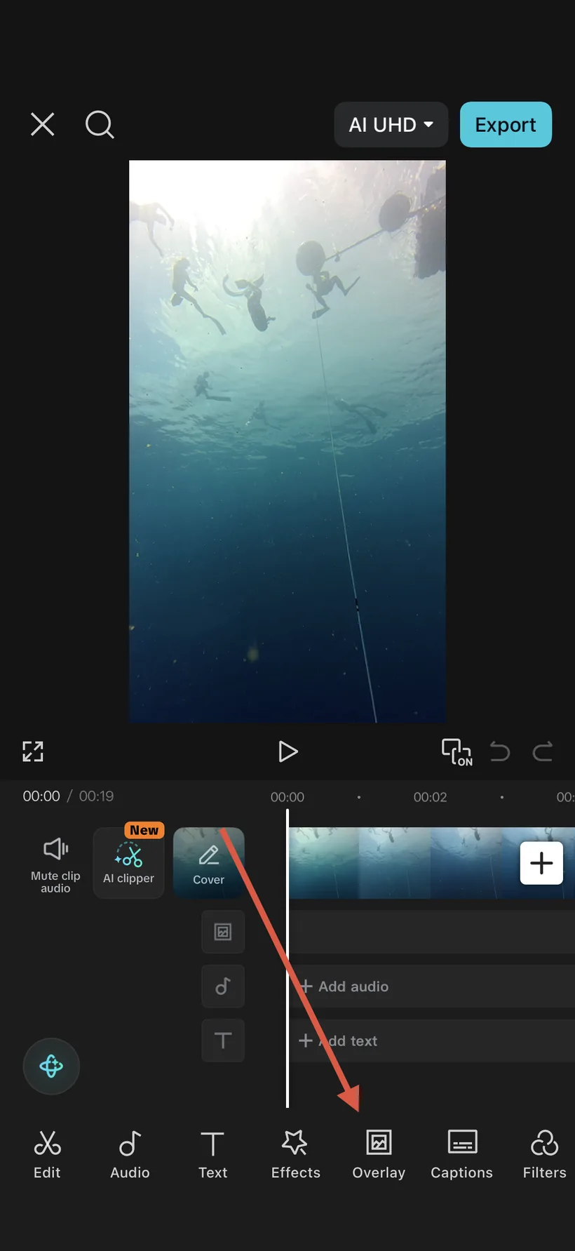 Start a project with your dive clip, then tap Overlay → Add overlay.